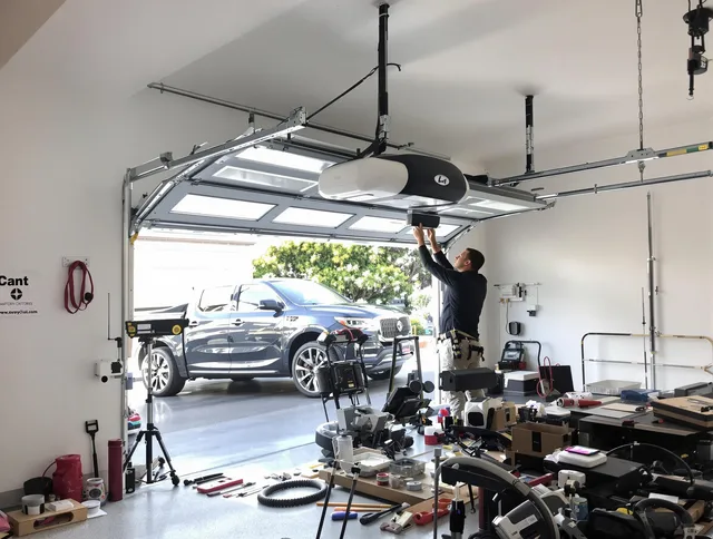 North Castle Garage Door Repair specialist installing smart garage door opener system in North Castle home
