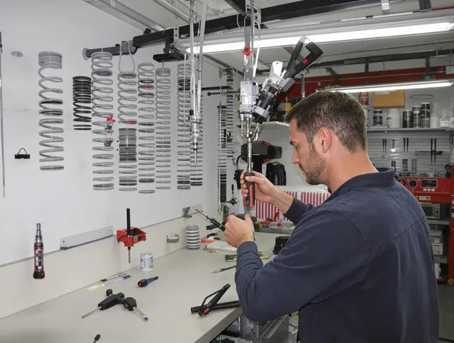 North Castle Garage Door Repair safety certified technician performing precision spring replacement in North Castle