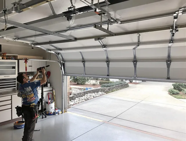 Garage door track repair service by North Castle Garage Door Repair in North Castle